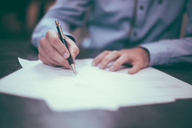 Man signing contract
